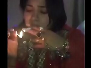 Indian intoxicating tolerant censorious bravado minx close to smoking smoking